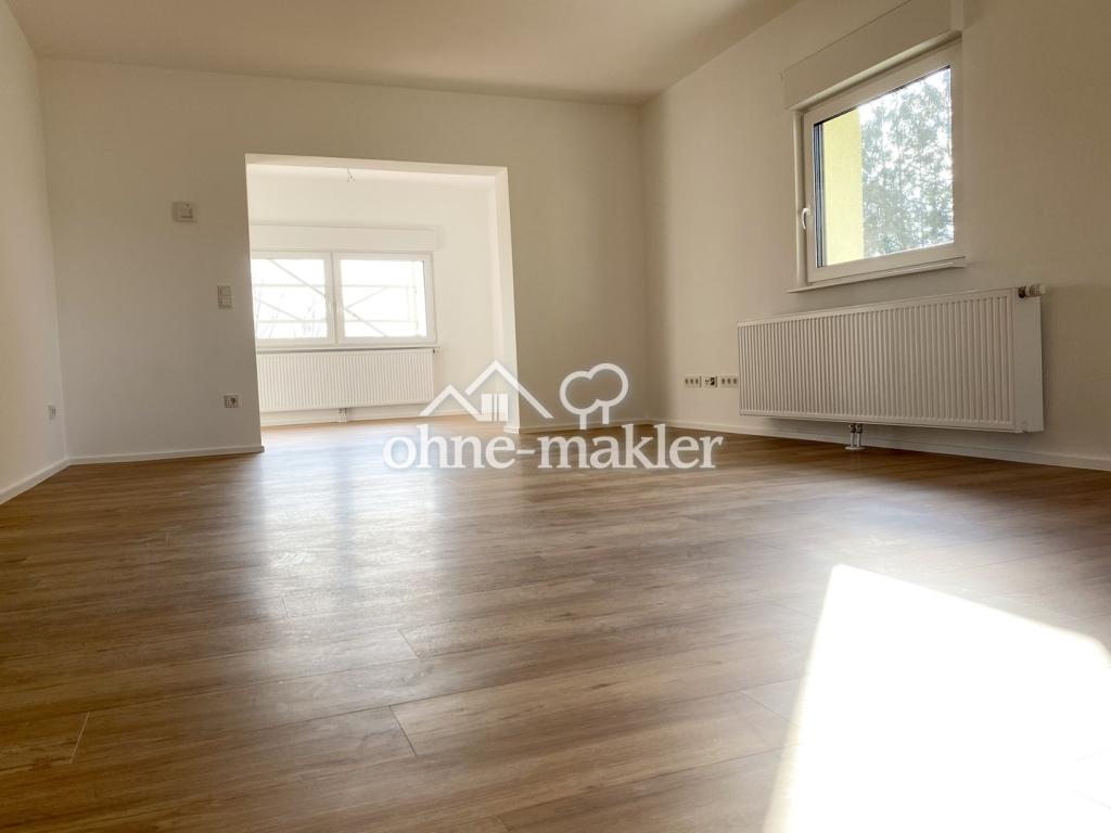 Exklusives Wohnen in renoviertem Zweifamilienhaus - Erdgeschosswohnung mit Zugang ins Grüne - Photo 4
