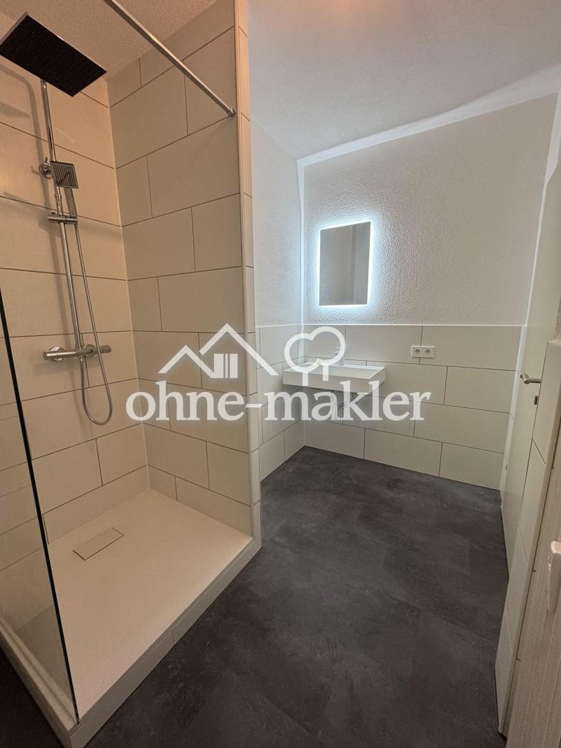 Erstbezug nach Komplettsanierung – helle 2-Zimmer-Wohnung (56 m²) mit neuem Parkett & Einbauküche - Foto 4