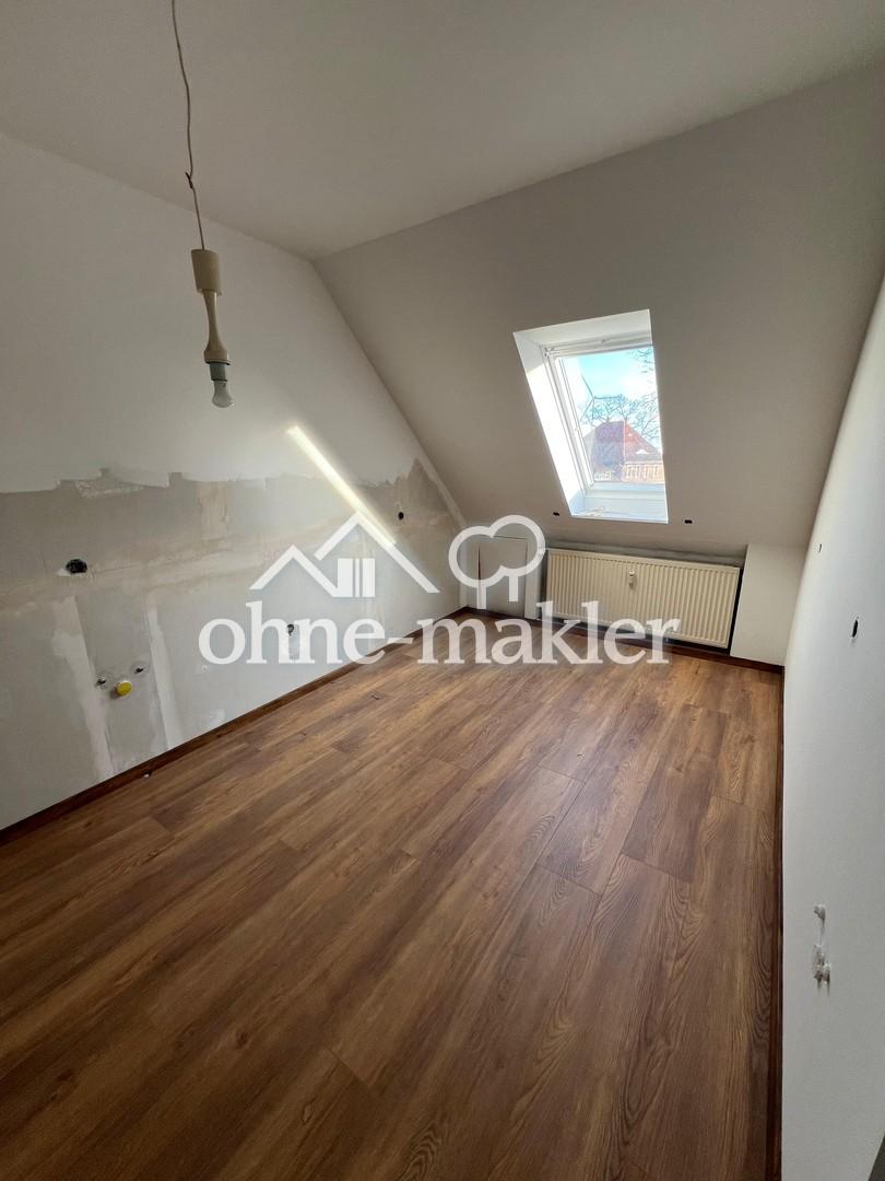 Sanierte 2 Zimmer Dachgeschosswohnung mit Küche und Sauna - Foto 3