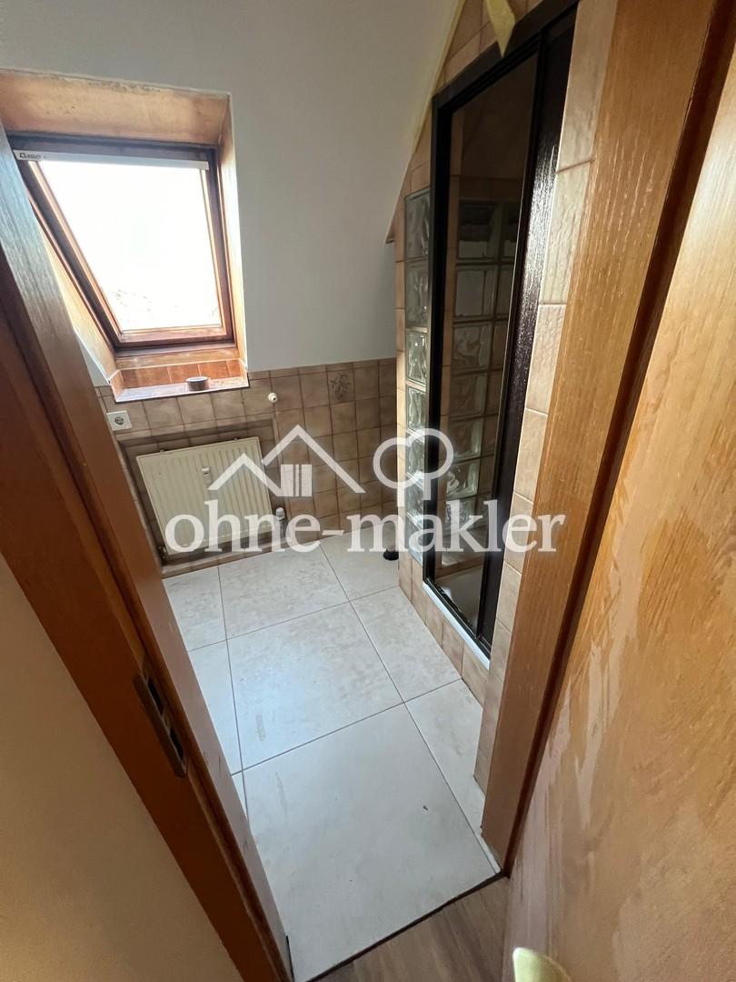 Sanierte 2 Zimmer Dachgeschosswohnung mit Küche und Sauna - Foto 1