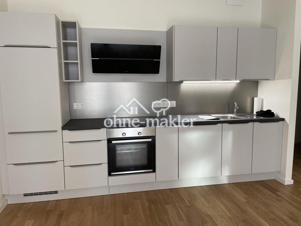 Moderne Neubauwohnung mit EBK, Aufzug und Abstellraum! - Foto 2