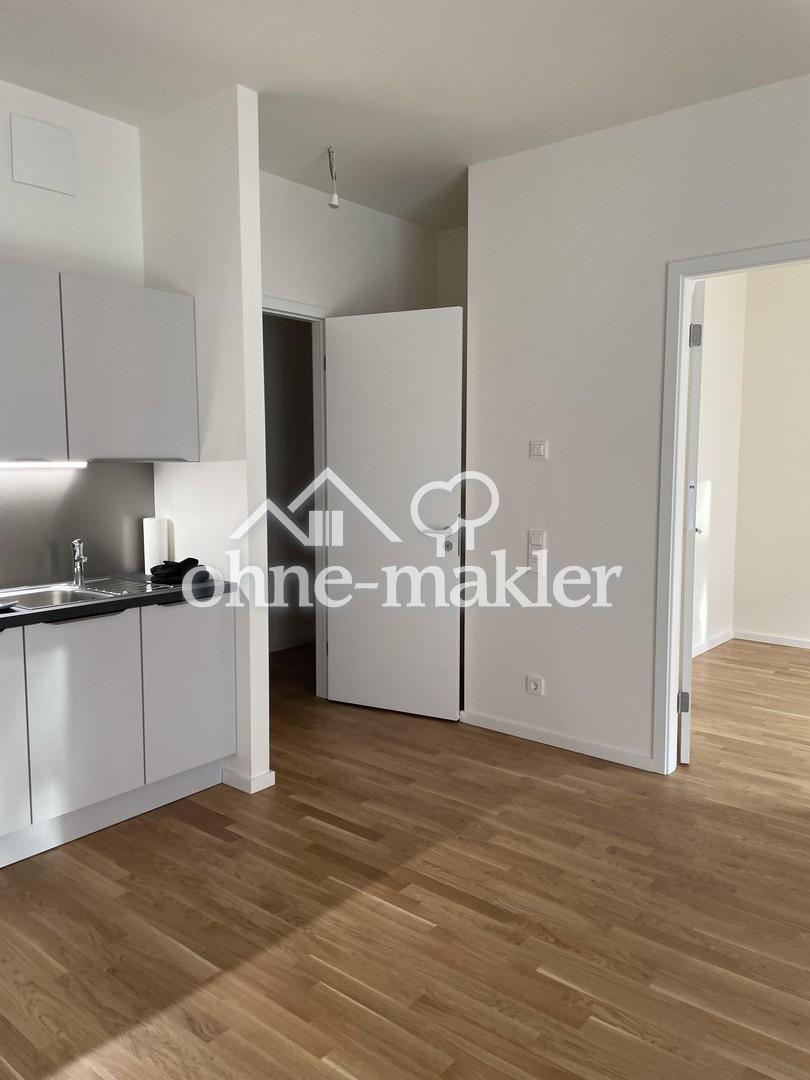 Moderne Neubauwohnung mit EBK, Aufzug und Abstellraum! - Foto 3