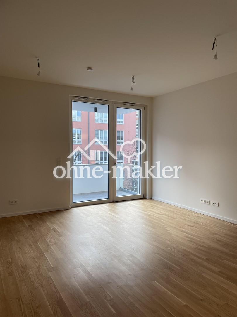 Moderne Neubauwohnung mit EBK, Aufzug und Abstellraum! - Foto 1
