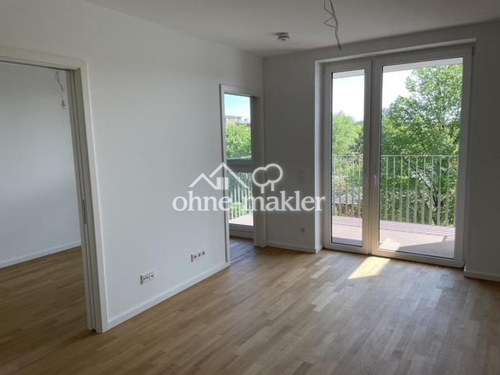 Neubau-Erstbezug im 5. OG – 2-Zimmer mit Balkon & Blick ins Grüne in aufstrebendem Quartier - Photo 1