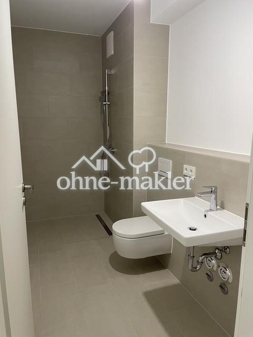 Neubau-Erstbezug im 5. OG – 2-Zimmer mit Balkon & Blick ins Grüne in aufstrebendem Quartier - Photo 5