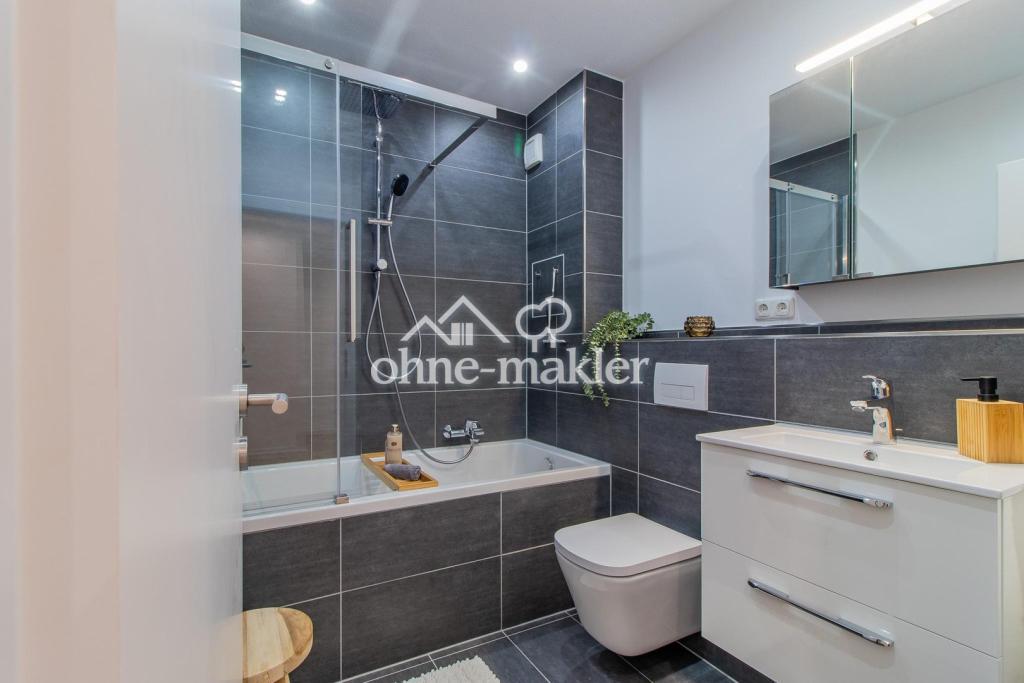 Erstbezug nach Modernisierung: Wohntraum mit Einbauküche und Wellness-Bad in Top-Lage - Photo 4