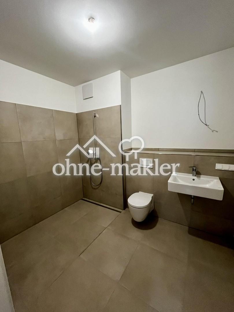 Neubau 3-Zimmer Wohnung mit sonniger Terrasse und Garten - Foto 4