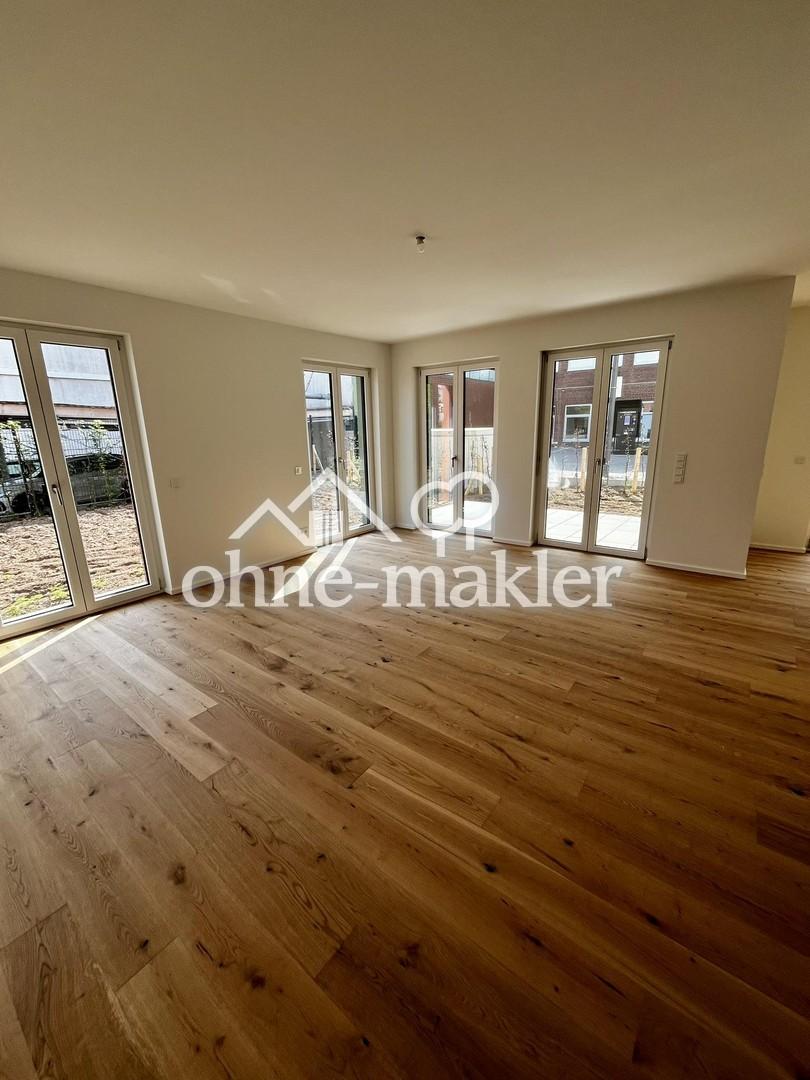 Neubau 3-Zimmer Wohnung mit sonniger Terrasse und Garten - Foto 2
