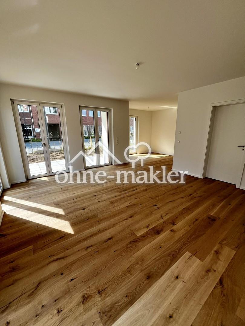 Neubau 3-Zimmer Wohnung mit sonniger Terrasse und Garten - Foto 1