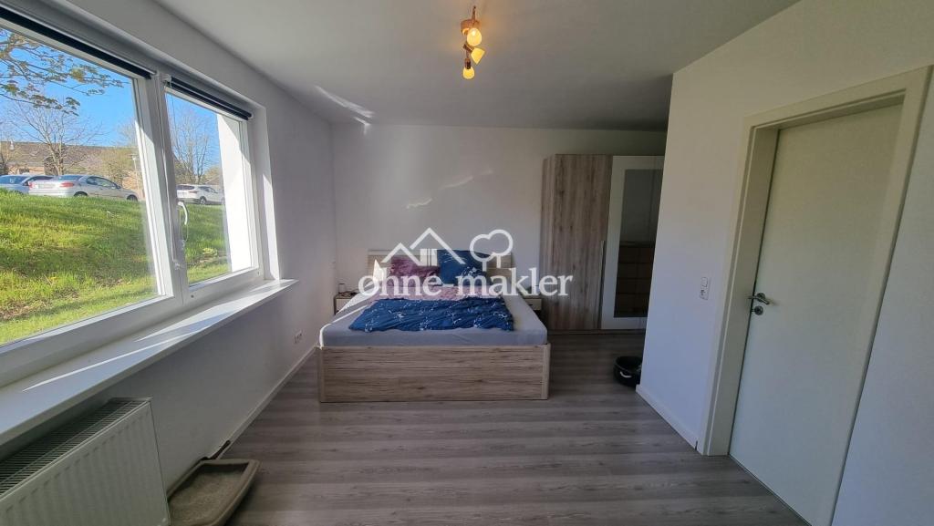 2-Zimmer-EG-Wohnung mit ca. 63 qm, weißem Vollbad und neuer EBK - Foto 2