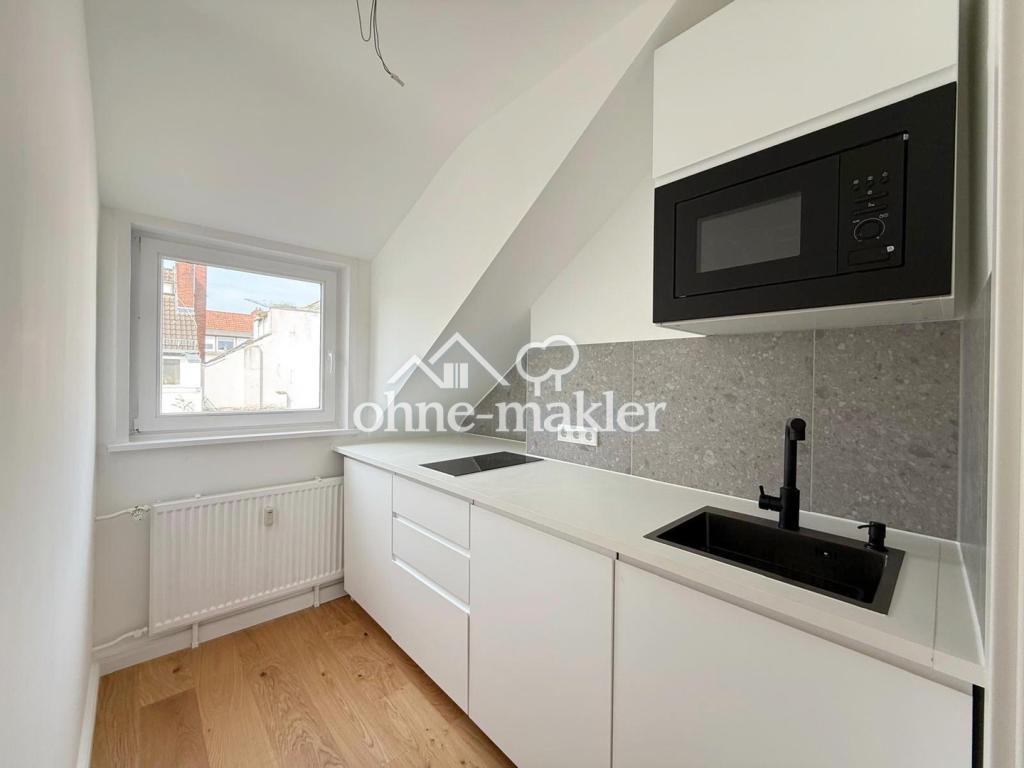 Erstbezug! Sanierte 2-Zimmer DG Wohnung mit Balkon und Einbauküche im Viertel - Foto 1