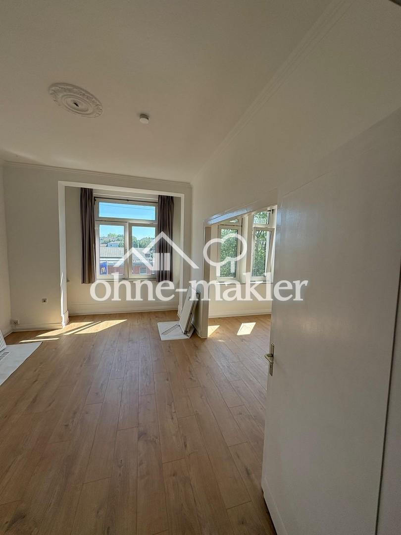 Frisch renovierte 2,5-Zimmer-Altbauwohnung mit Balkon in zentraler Lage von Solingen-Ohligs - Photo 2