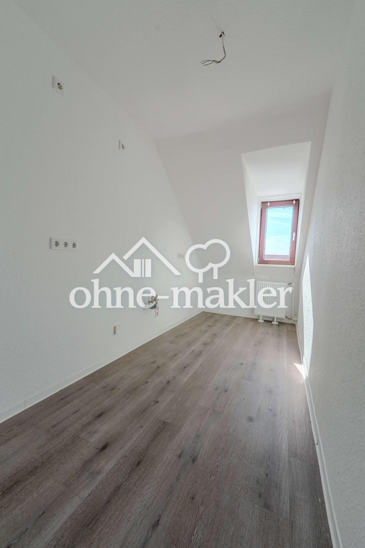 Helle 2-Zimmer-Dachgeschosswohnung mit besonderem Charme - Foto 4