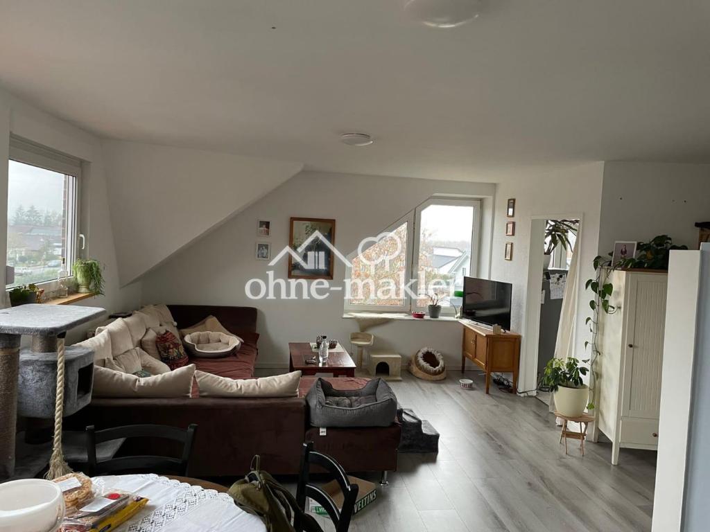 Helle Dachgeschosswohnung mit Kamin - Photo 1
