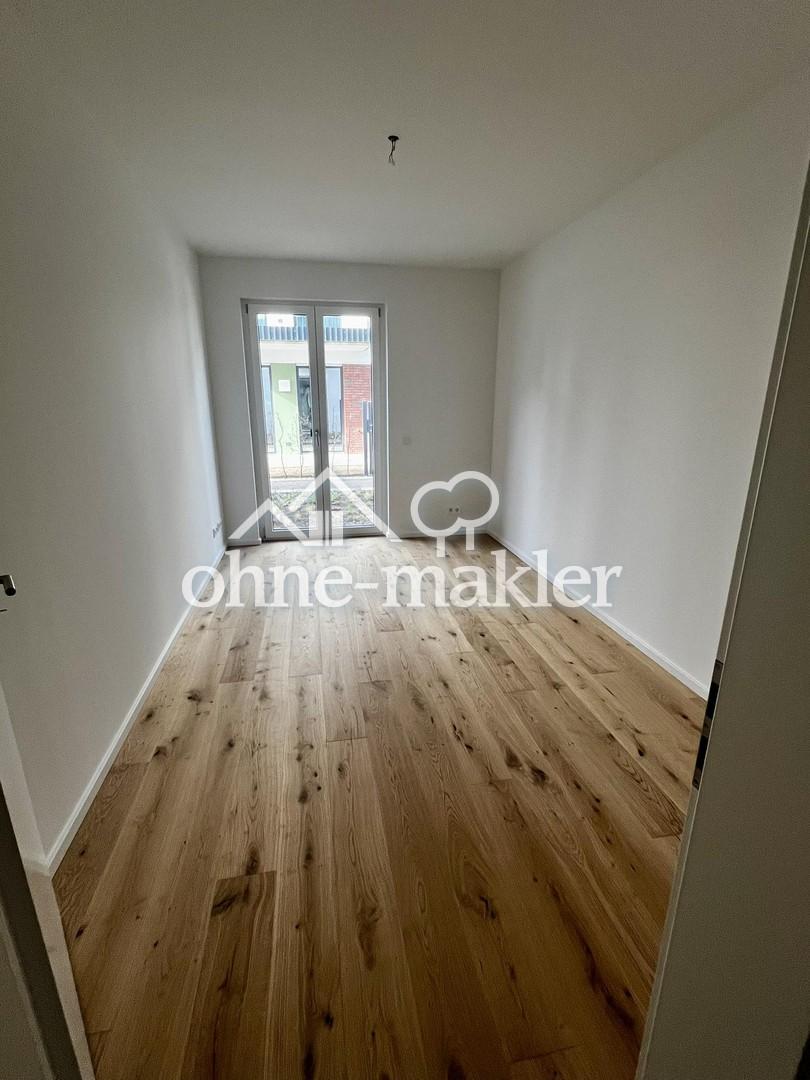 Lichtdurchflutete Neubau-Gartenwohnung mit Terrasse & hochwertiger Ausstattung - Photo 2