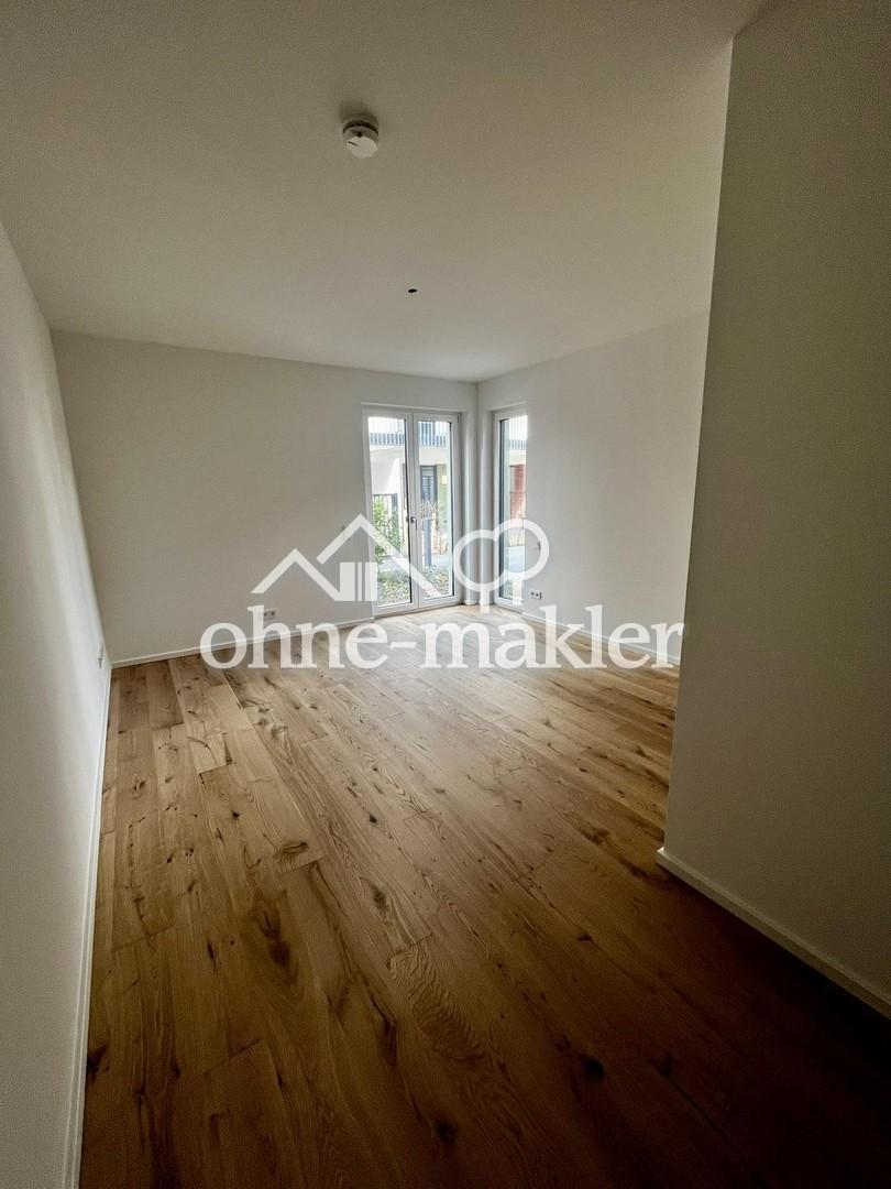 Lichtdurchflutete Neubau-Gartenwohnung mit Terrasse & hochwertiger Ausstattung - Photo 4