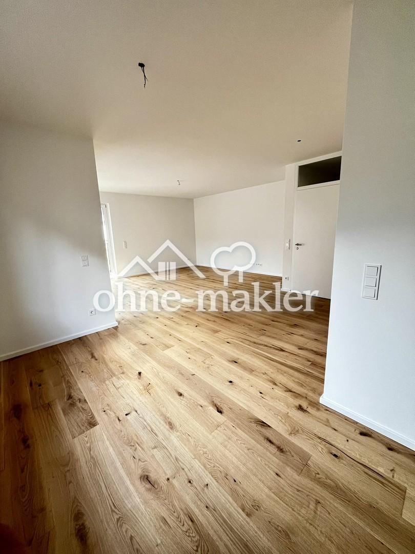 Lichtdurchflutete Neubau-Gartenwohnung mit Terrasse & hochwertiger Ausstattung - Photo 1