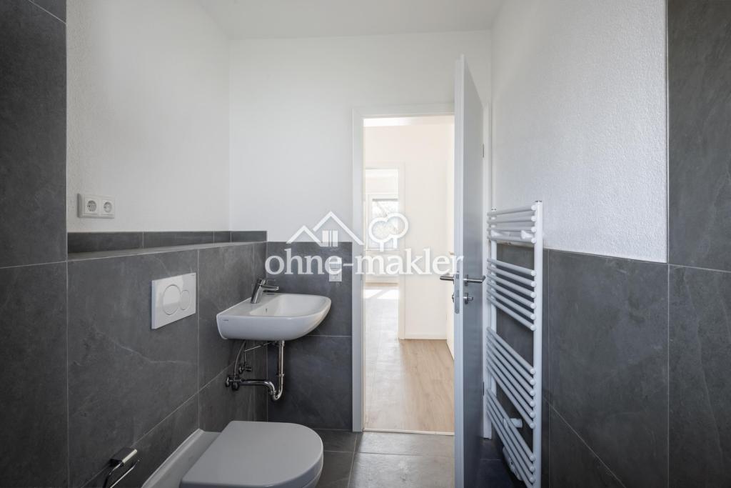 Erstbezug nach Kernsanierung: Helle 3-Zimmer-Wohnungen in Mehrfamilienhaus (1.OG & 2.OG) - Photo 2