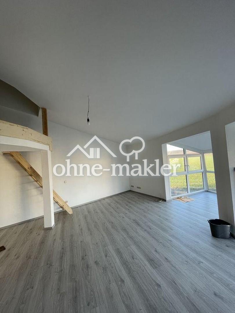 Traumhafte Wohnung mit Wintergarten, moderner Küche & unverbaubarem Fernblick! - Photo 3