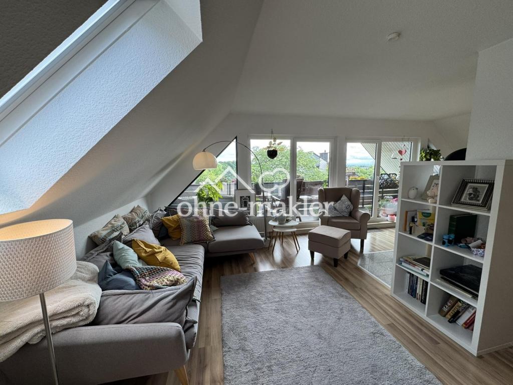 Charmante Dachgeschosswohnung mit Weitblick – 4 Zimmer, Kamin & Sonnenbalkon - Photo 4