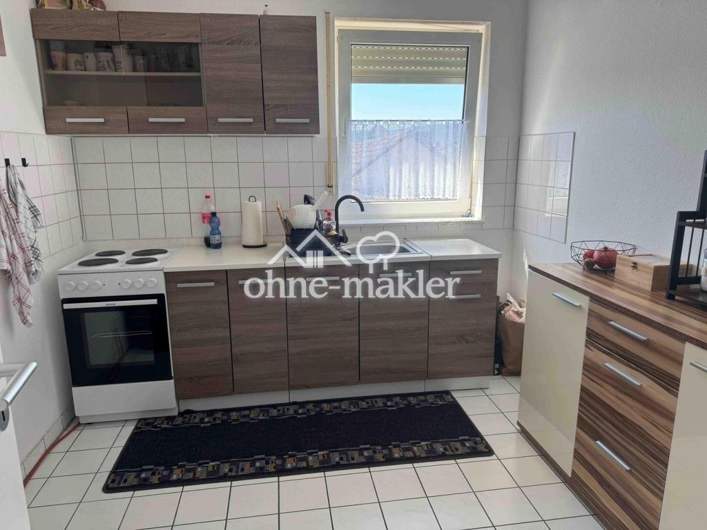 Helle und gepflegte 3-Zimmer-Dachgeschosswohnung mit Balkon, Einbauküche, Stellplatz & Keller - Photo 5
