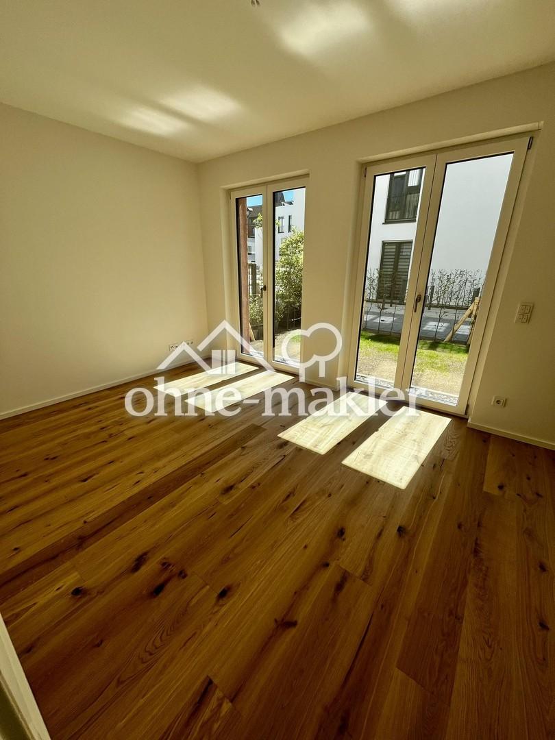 Moderne 2-Zimmer-Neubauwohnung mit Terrasse & Garten in den Wolf Höfen - Photo 4