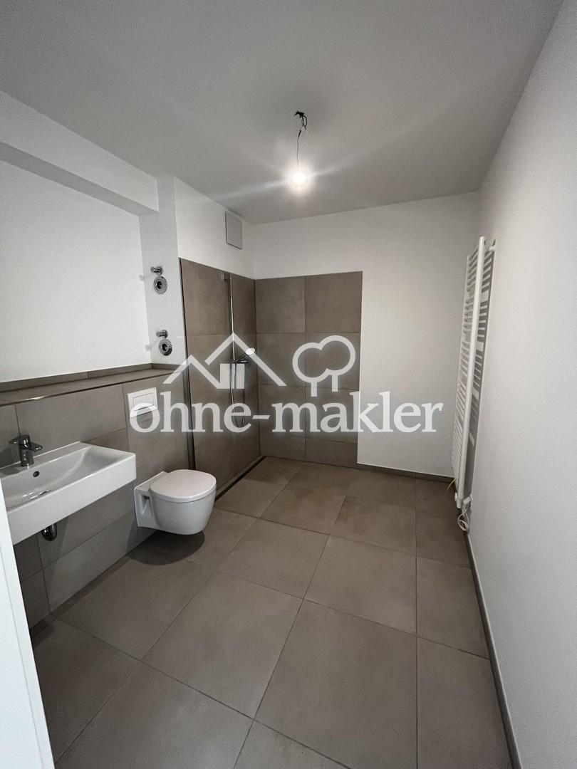 Moderne 2-Zimmer-Neubauwohnung mit Terrasse & Garten in den Wolf Höfen - Photo 5
