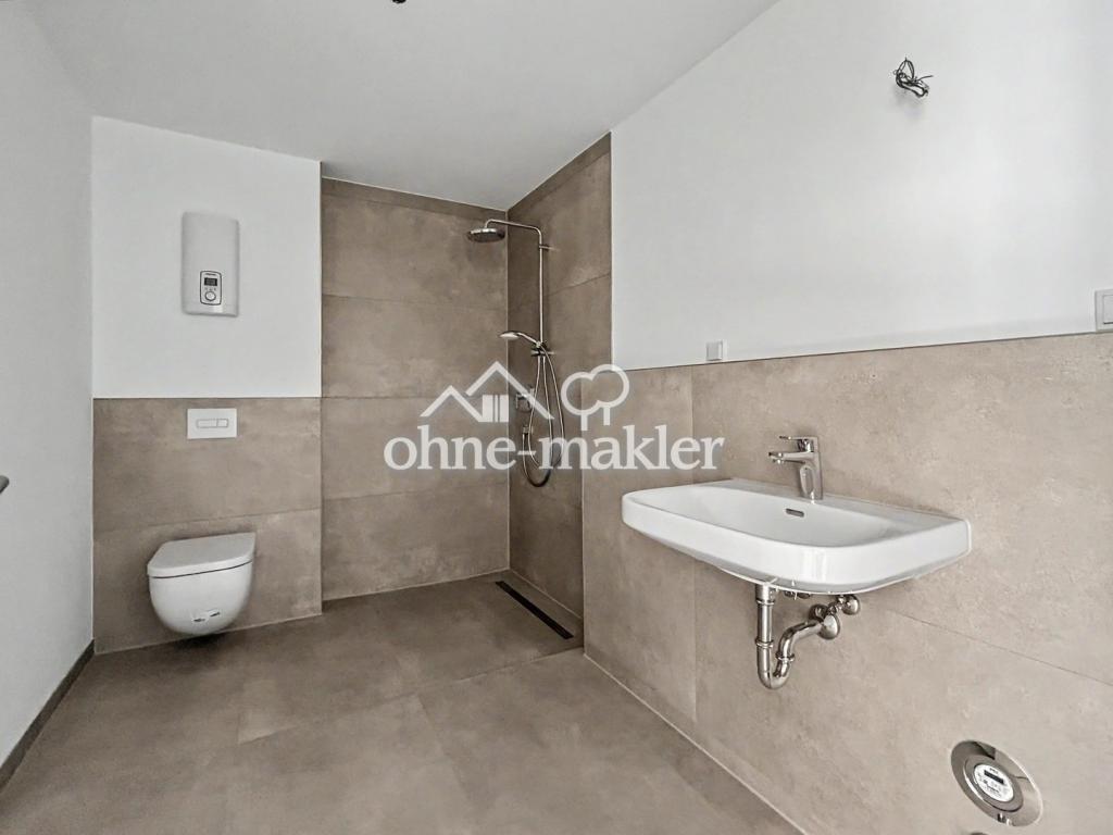 Neubau-Erstbezug: Barrierefreie 3-Zimmer-Wohnung mit Sonnenbalkon und moderner Ausstattung - Foto 5
