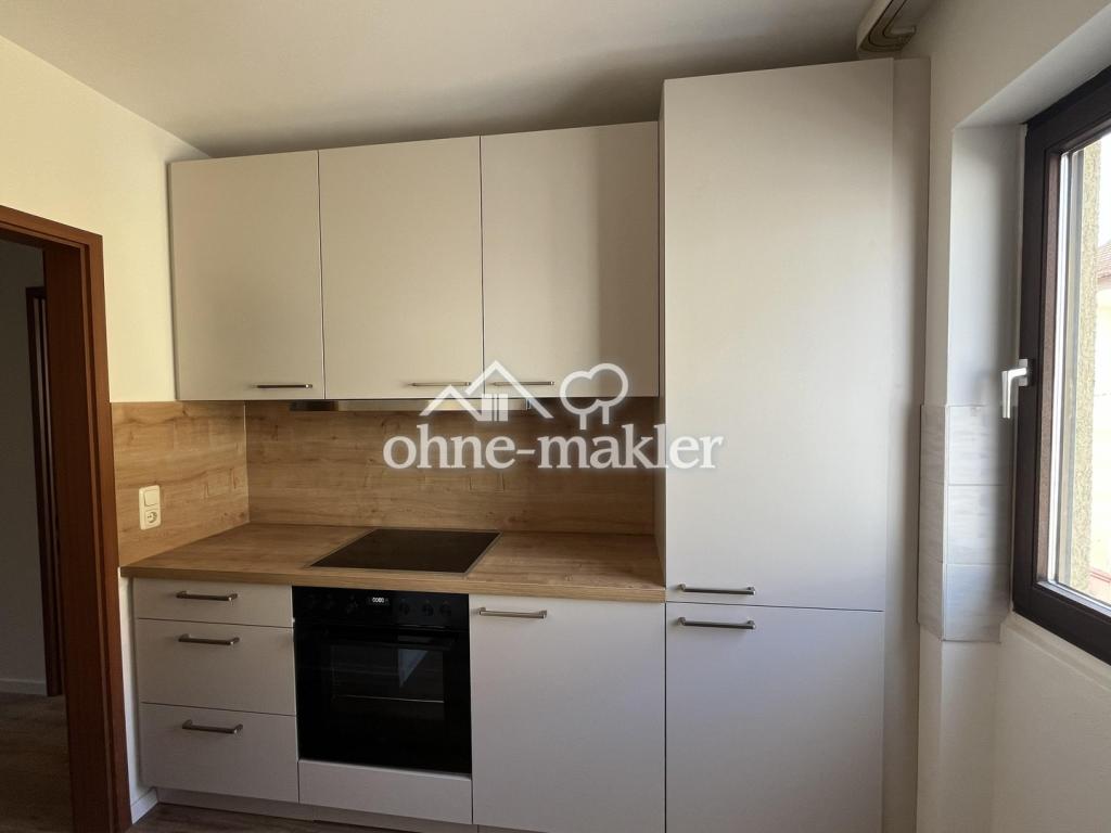 Sanierte helle 2-Zimmer-Wohnung mit Balkon & TG-Stellplatz - Foto 3