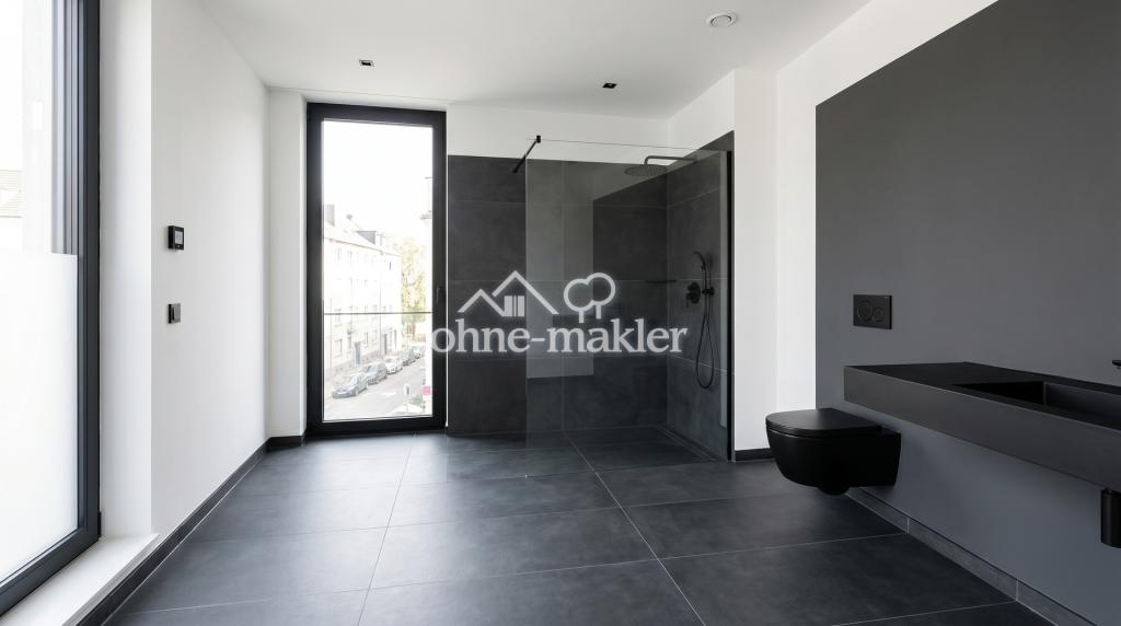 Urbanes Dark Loft in Ehrenfeld: Modernes Design trifft industriellen Charme - Foto 2