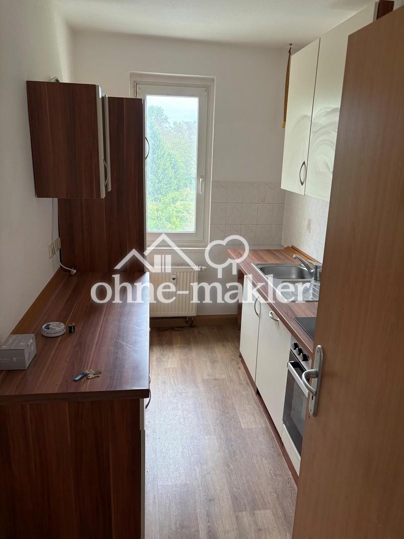Gut geschnittene 3-Raum-Wohnung mit Einbauküche in gepflegtem Mehrfamilienhaus - Photo 5