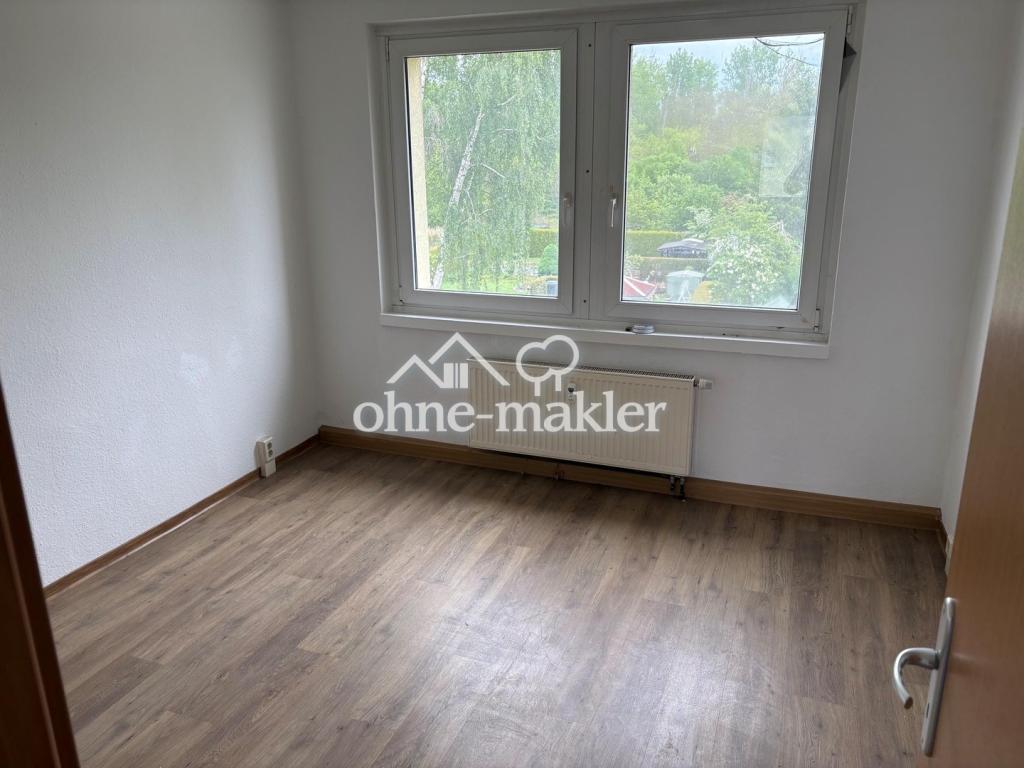 Gut geschnittene 3-Raum-Wohnung mit Einbauküche in gepflegtem Mehrfamilienhaus - Photo 2