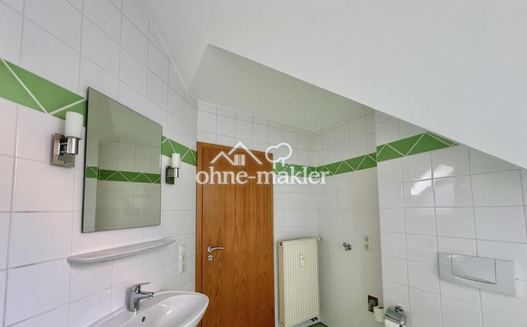 Sehr gepflegte DG-Wohnung in Schweich, mit Einbauküche, Balkon, PKW-Stellpl. - Foto 4