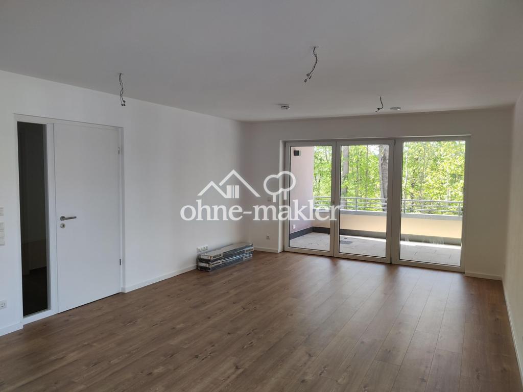 Moderne 2-Zimmer-Neubauwohnung mit großem Balkon und Blick ins Grüne - Photo 1
