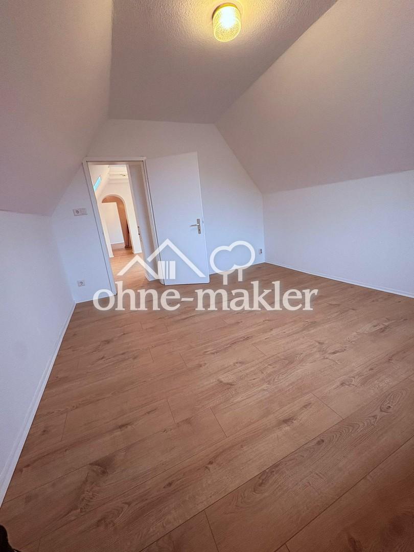 Gemütliche 2,5 Zimmer-Dachgeschosswohnung in Lützenkirchen - Foto 1