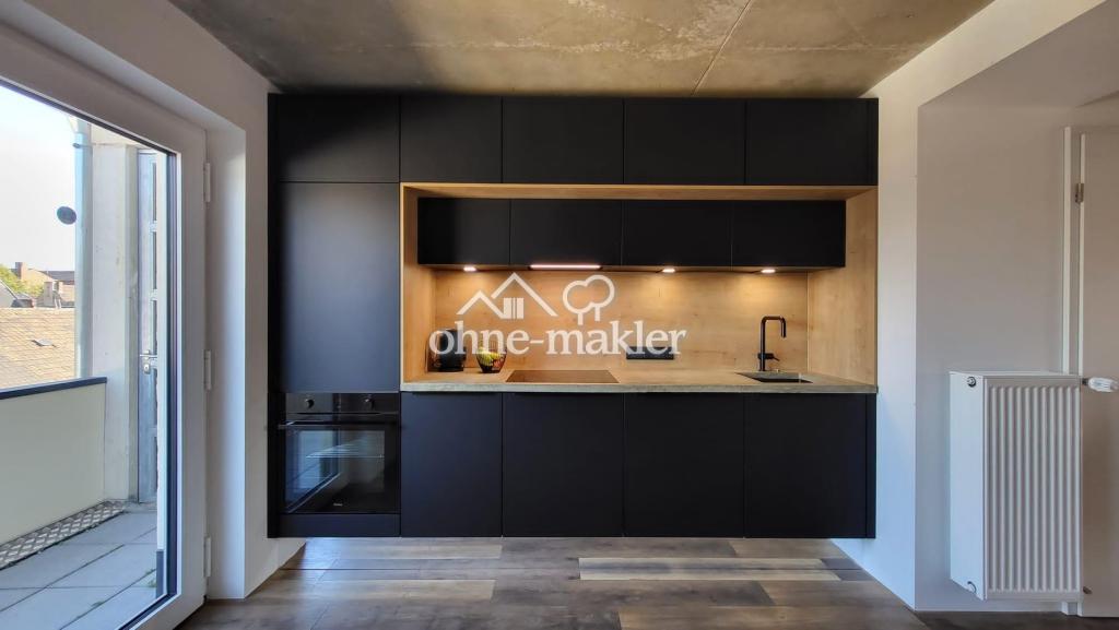 Designwohnung mit Fabrikanmutung, Sichtbeton und gelegentlich Dom- und Rheinblick - Foto 1