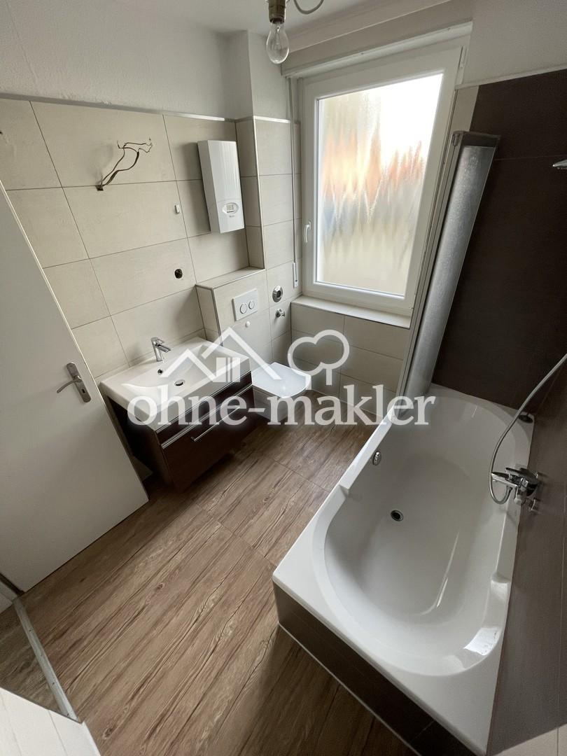 Schöne 3-Zimmer-Erdgeschosswohnung mit Einbauküche, Tageslichtbad & Gartenzugang in Schwerte - Photo 4