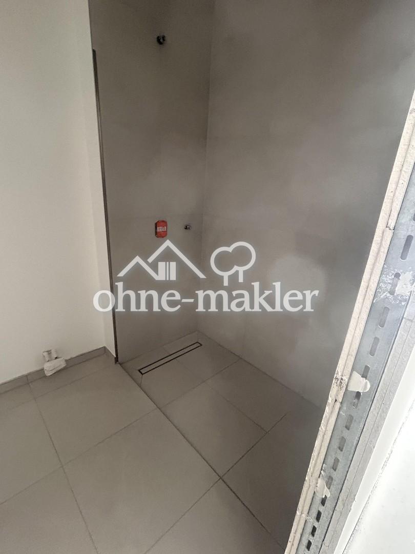 Erstbezug 2026: Helle 2-Zi.-Wohnung in ruhiger Villenlage – Balkon ins Grüne, hohe Decken, TG - Photo 4