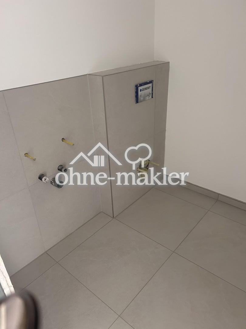 Erstbezug 2026: Helle 2-Zi.-Wohnung in ruhiger Villenlage – Balkon ins Grüne, hohe Decken, TG - Photo 5