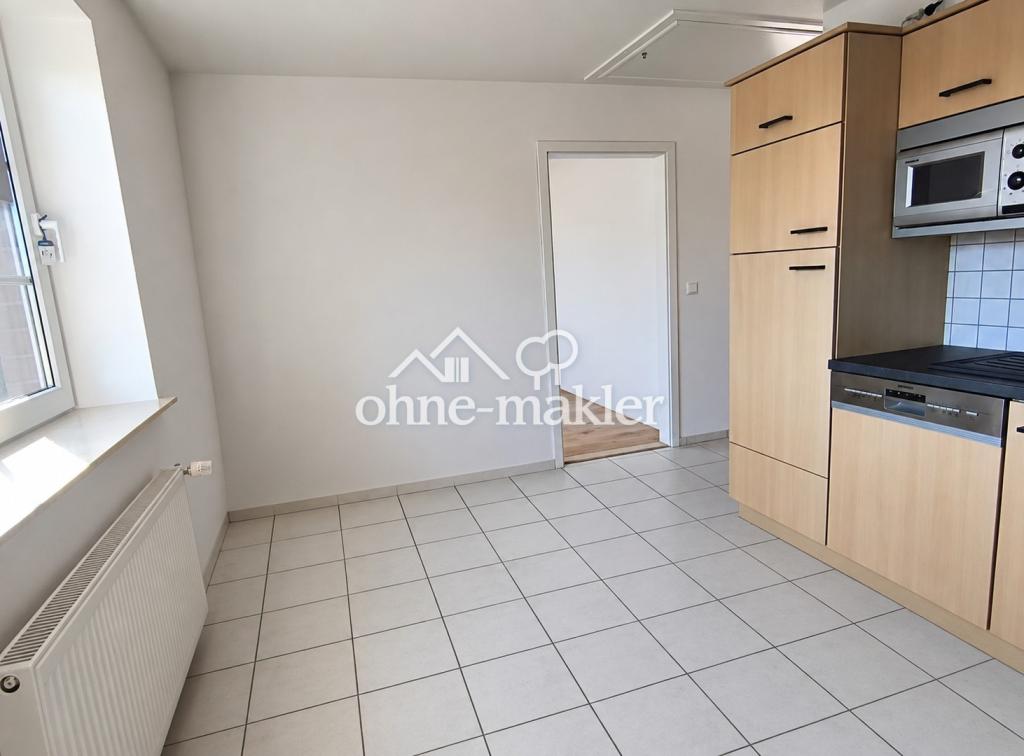 Lichtdurchflutete 2-Zi Dachgeschoßwohnung renoviert mit Gartennutzung in Satrup - Foto 1