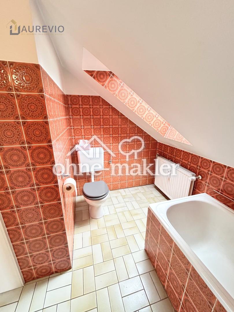 Gemütliche Dachgeschosswohnung mit Einbauküche in ruhiger Lage - Foto 3