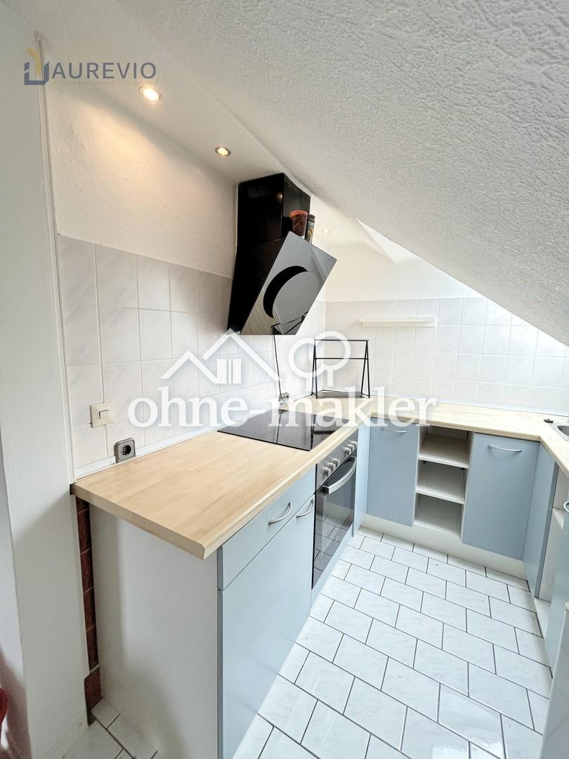 Gemütliche Dachgeschosswohnung mit Einbauküche in ruhiger Lage - Foto 2