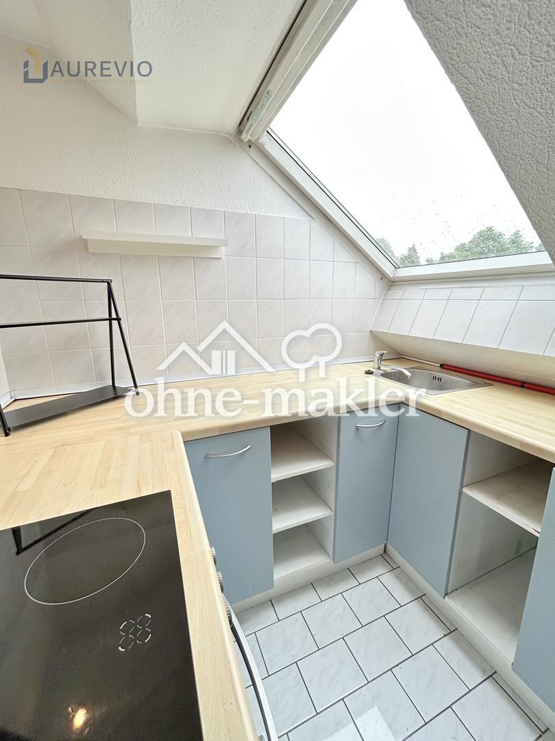 Gemütliche Dachgeschosswohnung mit Einbauküche in ruhiger Lage - Foto 1