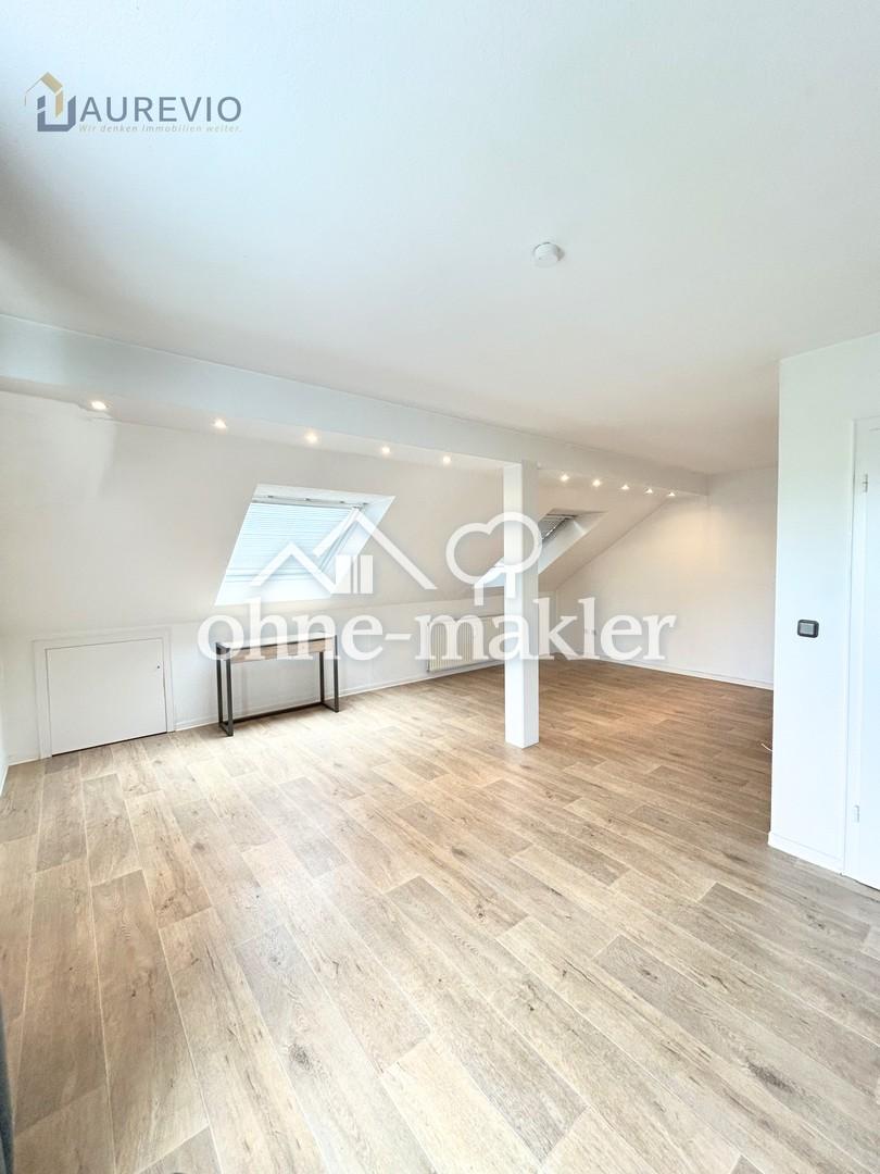 Gemütliche Dachgeschosswohnung mit Einbauküche in ruhiger Lage - Foto 5