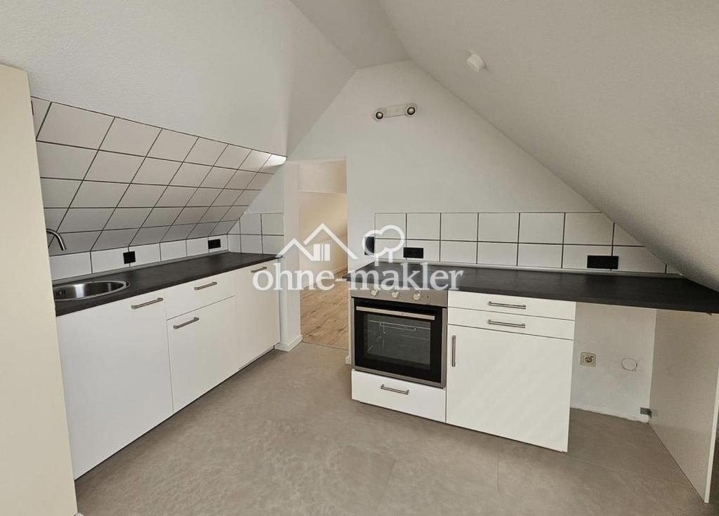Stilvolle Dachgeschosswohnung mit 2 Zimmern in ruhiger Umgebung - Foto 2