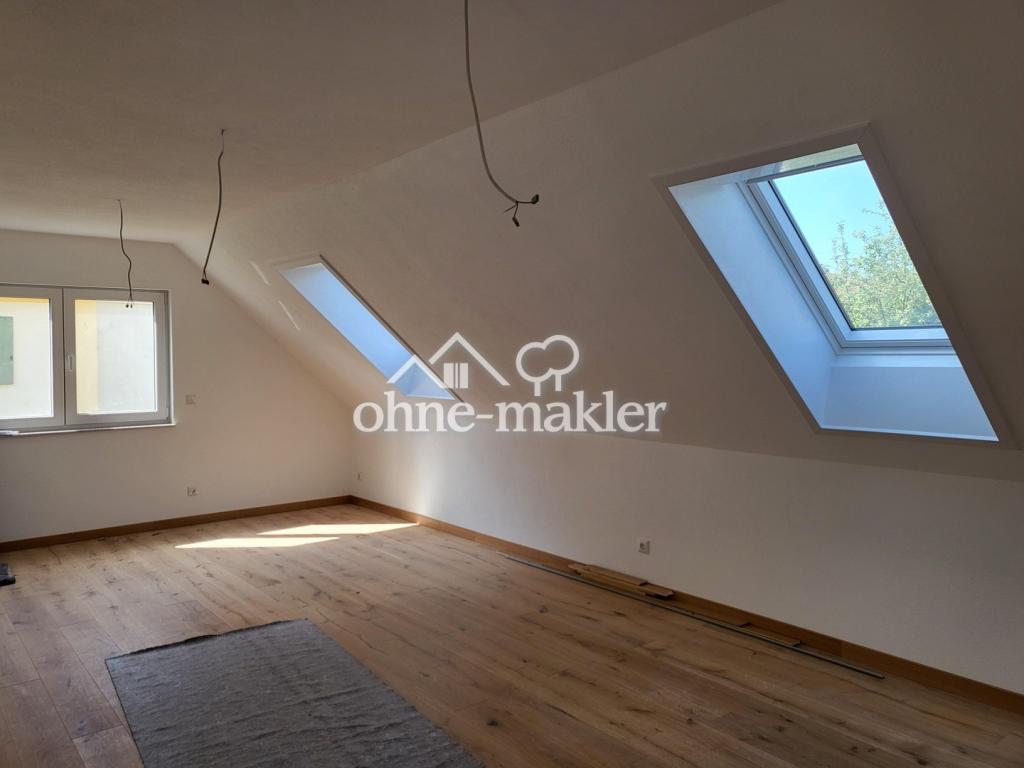 Erstbezug: Helle 2‑Zi‑DG‑Wohnung mit Carport und E‑Ladestation - Foto 2