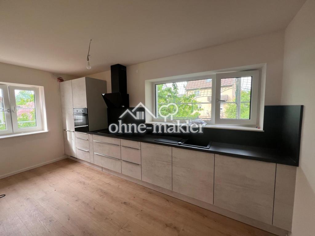 Erstbezug nach Kernsanierung: Wunderschöne 3,5-Zi-Wohnung mit Einbauküche, Kamin, Garten und mehr... - Photo 1
