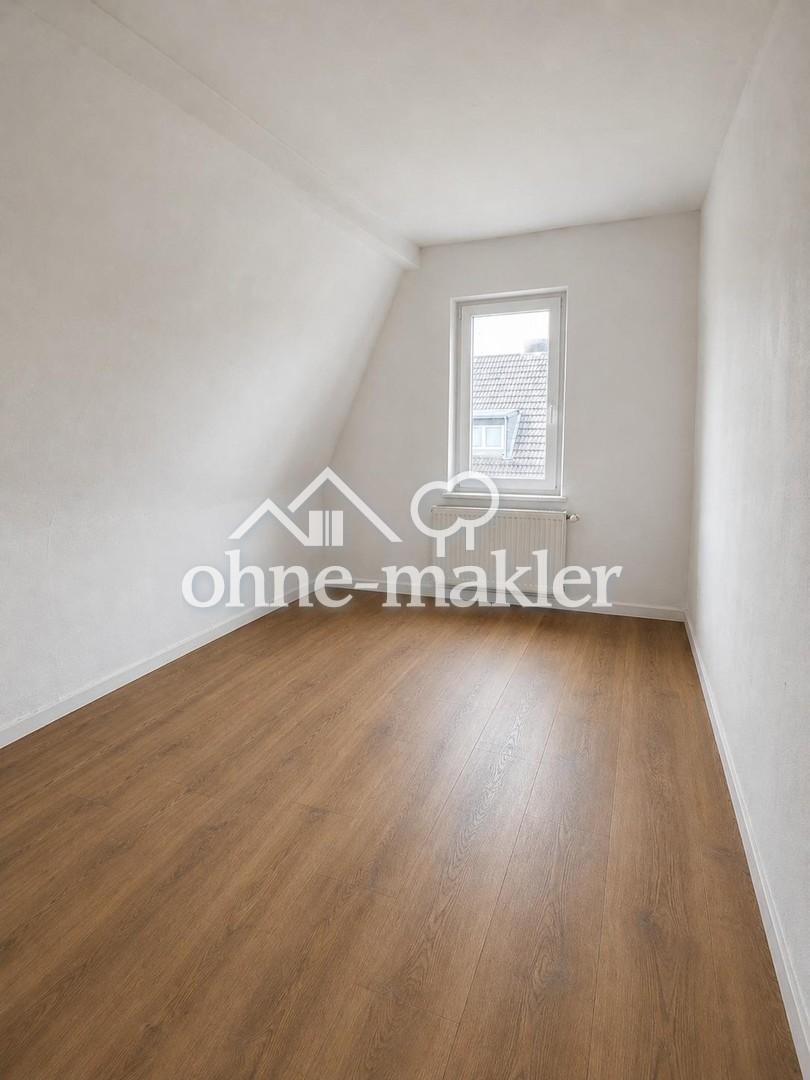 Schöne Wohnung mit ca. 45 qm Wohnfläche in ruhigem 4-Parteienhau - Foto 4