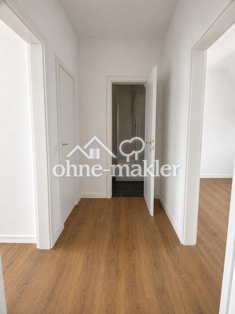 Schöne Wohnung mit ca. 45 qm Wohnfläche in ruhigem 4-Parteienhau - Foto 3