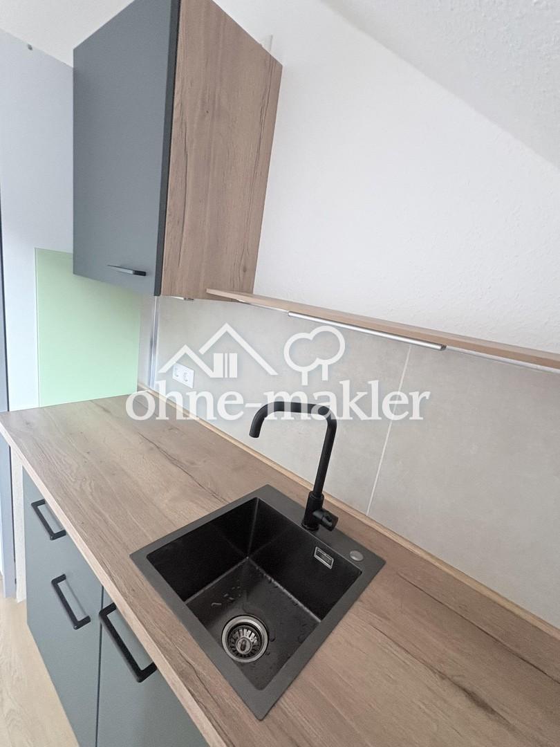 Ruhiges Rückzugs-Apartment im Dachgeschoss – frisch saniert & stilvoll eingerichtet - Photo 4